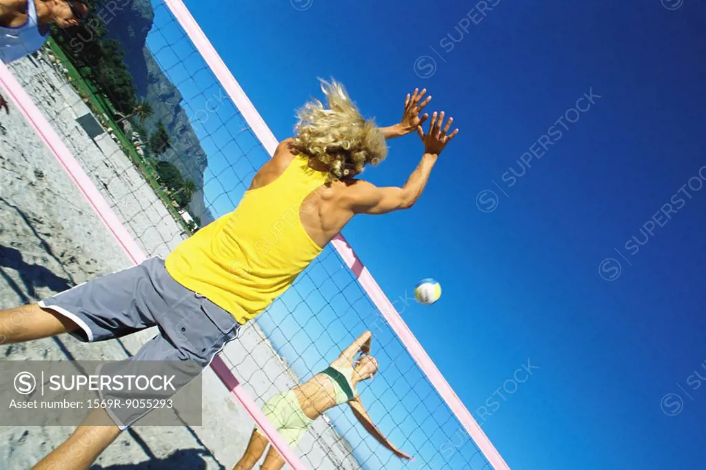 Male preparing to block volleyball