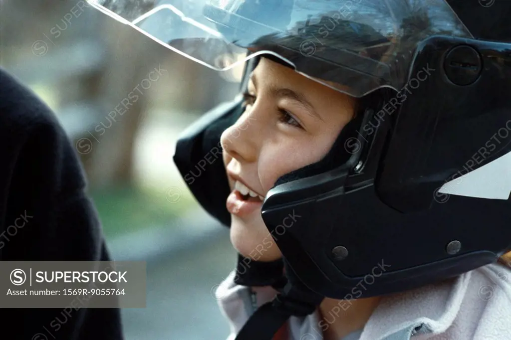 Girl wearing motorcycle helmet