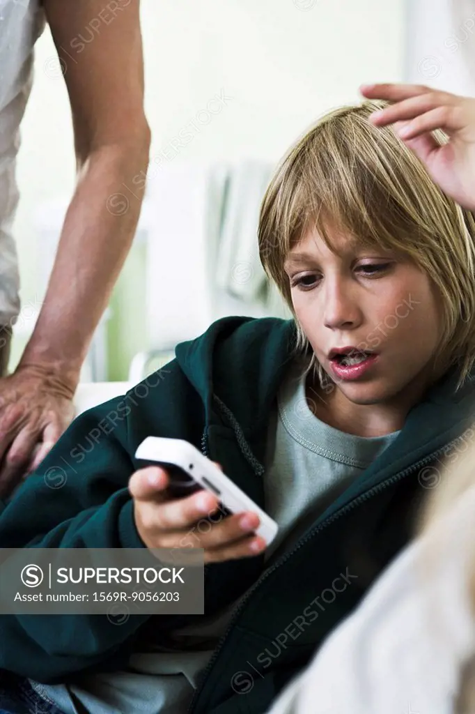 Boy looking at cell phone
