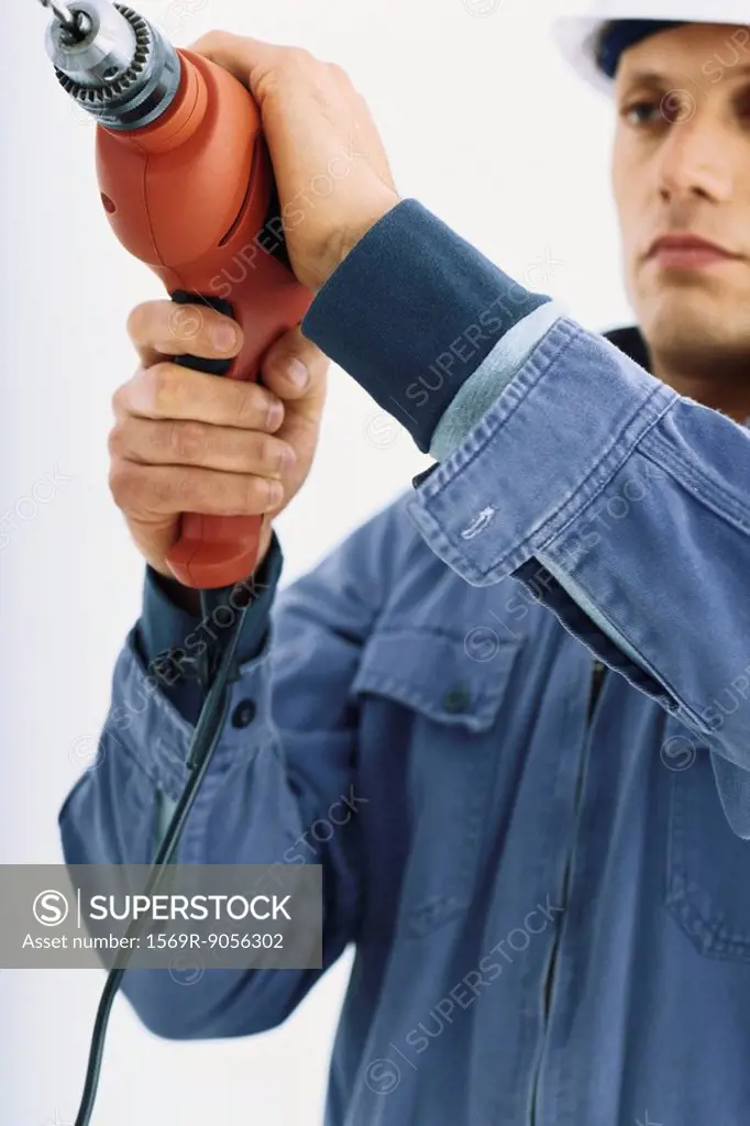 Handyman using drill