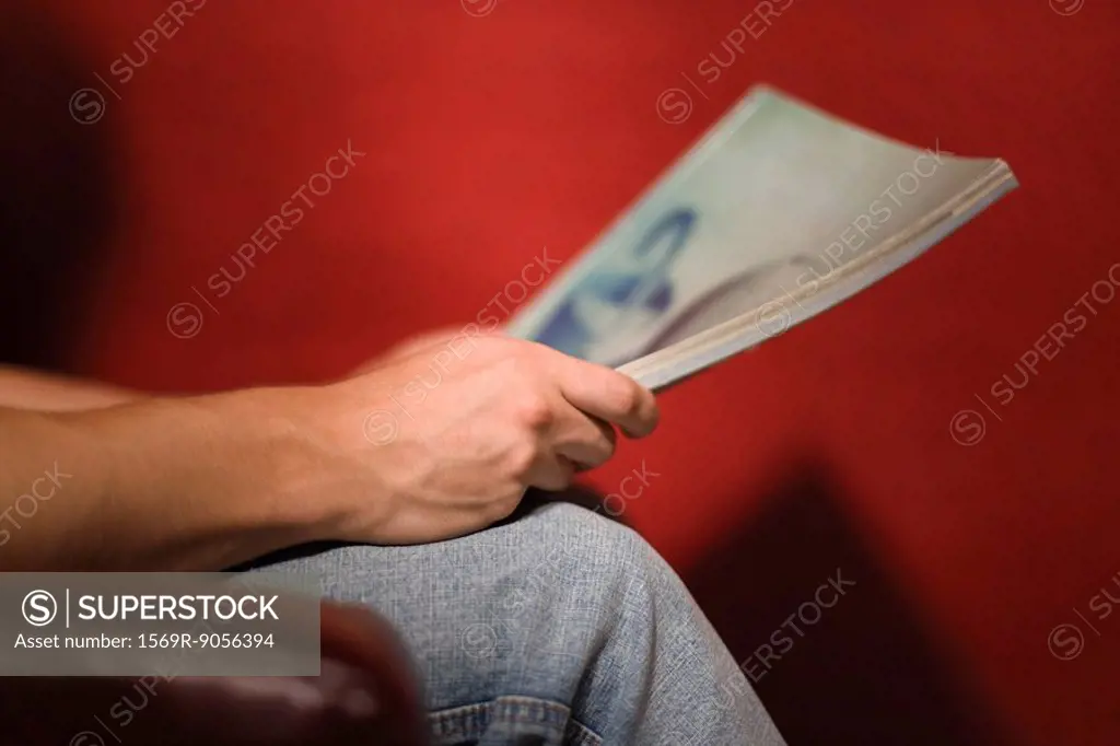 Man reading magazine