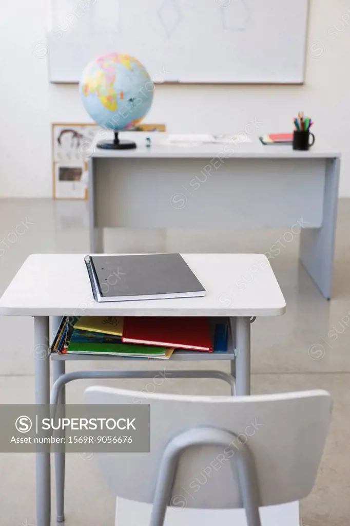 School desk and chair in classroom