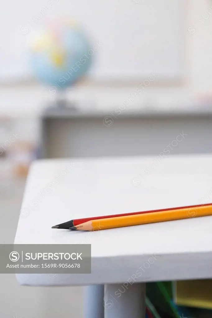 Sharpened pencils on school desk