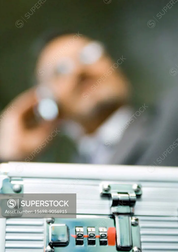 Combination lock on briefcase, extreme close-up