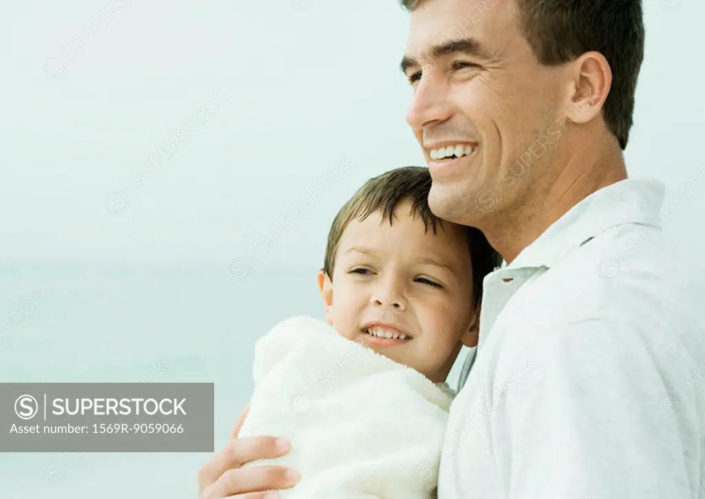 Father and son at the beach, portrait