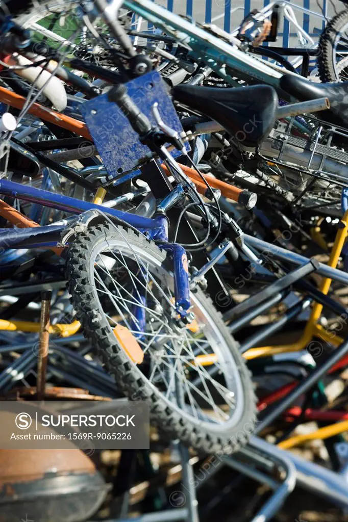 Bicycles in junk heap, close-up