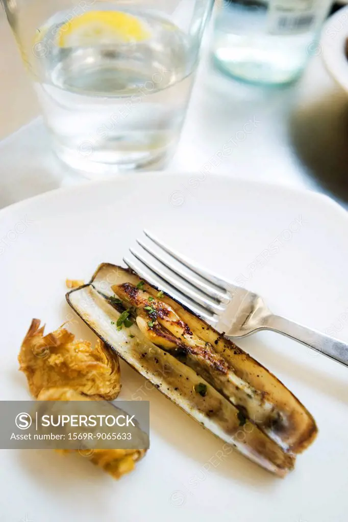 Steamed razor clam with fried artichoke heart