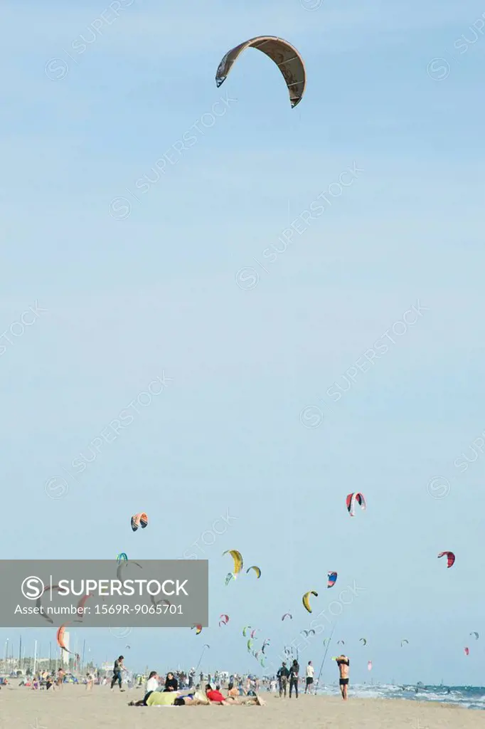 Kitesurfers on beach
