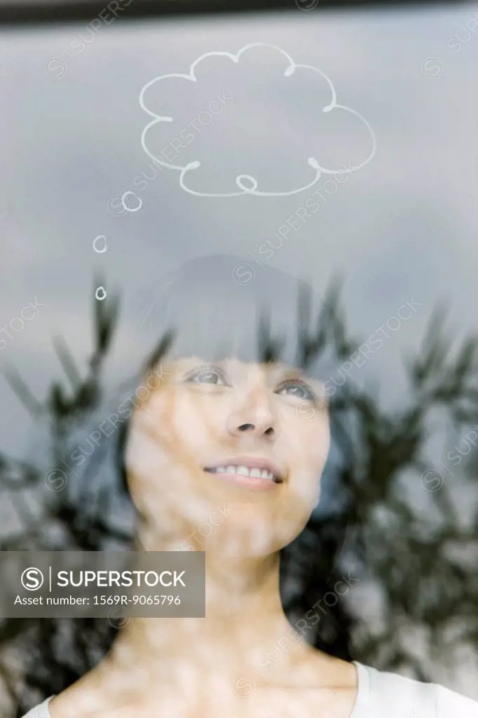 Young woman with thought bubble over head