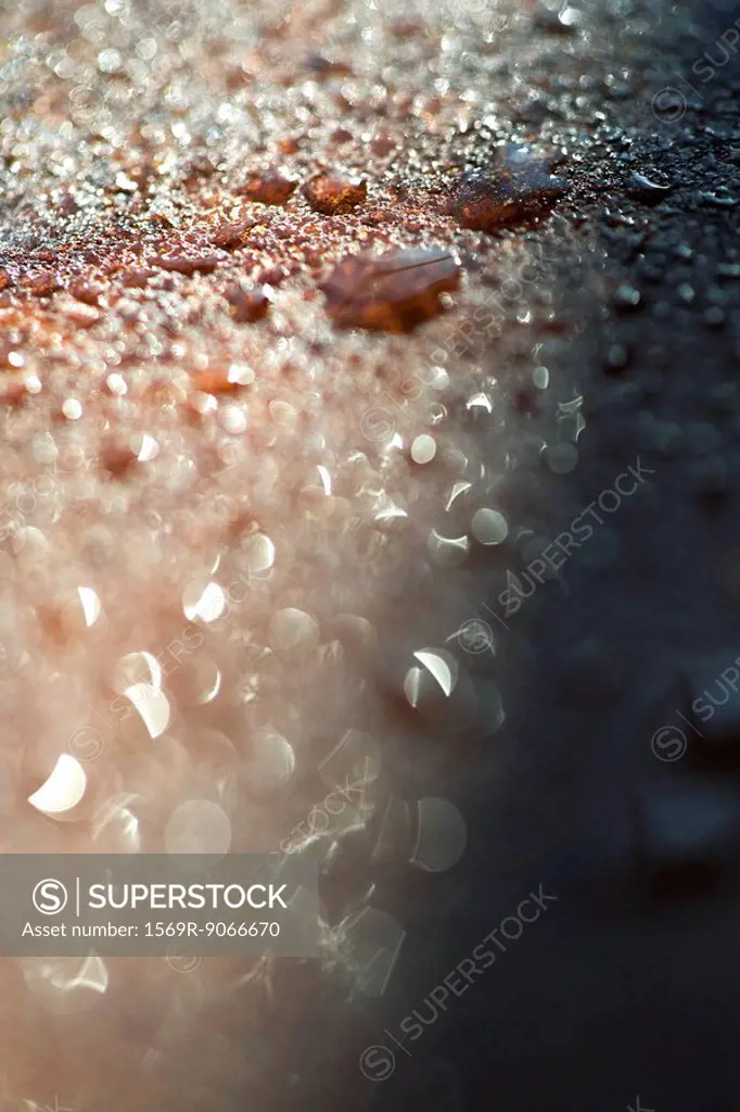 Water droplets on rocky surface, close_up