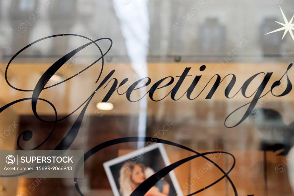 Greetings on shop window, close_up