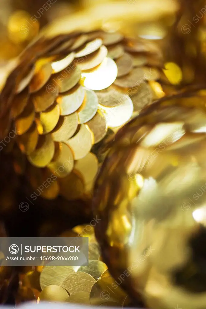 Golden sequined Christmas ornaments