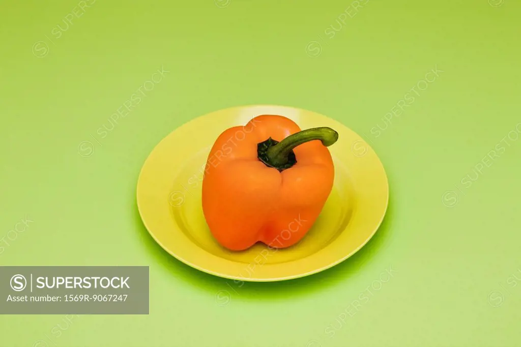 Yellow bell pepper on plate