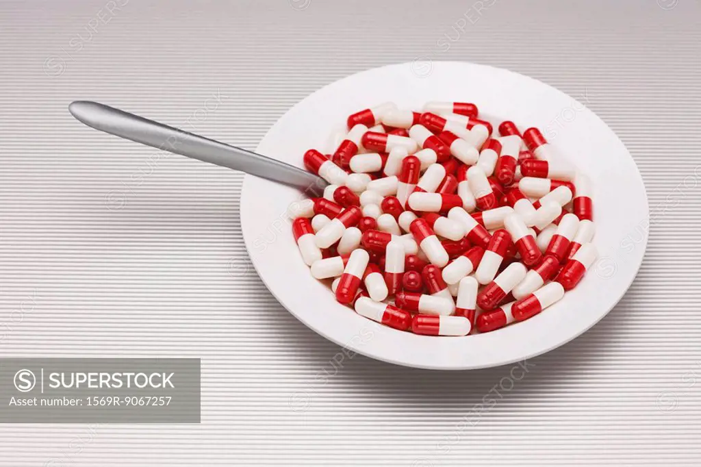 Food concept, bowl full of pills