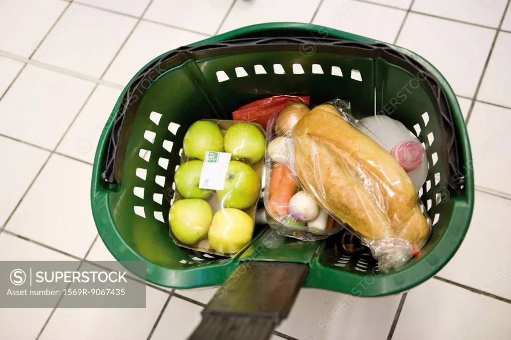 Shopping basket containing groceries