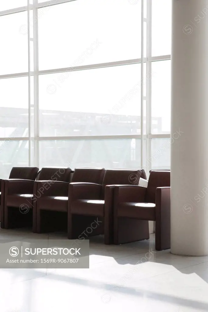 Empty armchairs in lobby