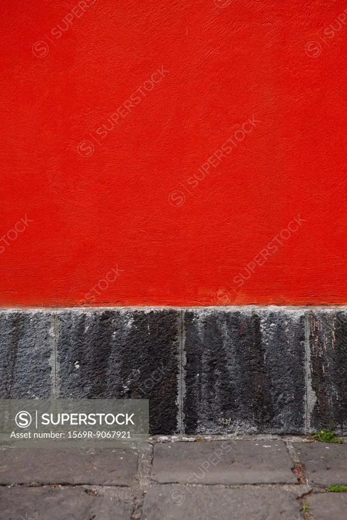 Red stucco wall, close_up