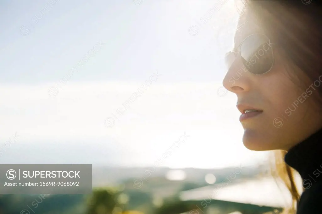 Woman wearing sunglasses, portrait