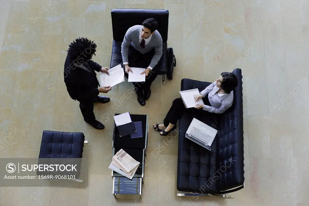 Executives working together, overhead view