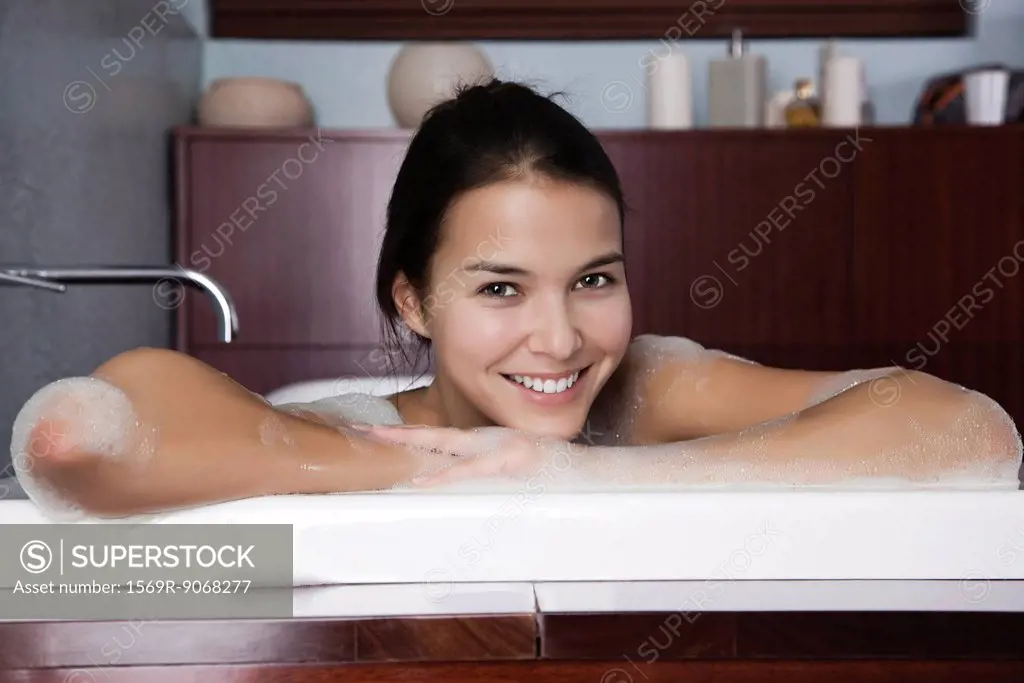 Woman relaxing in bath, portrait