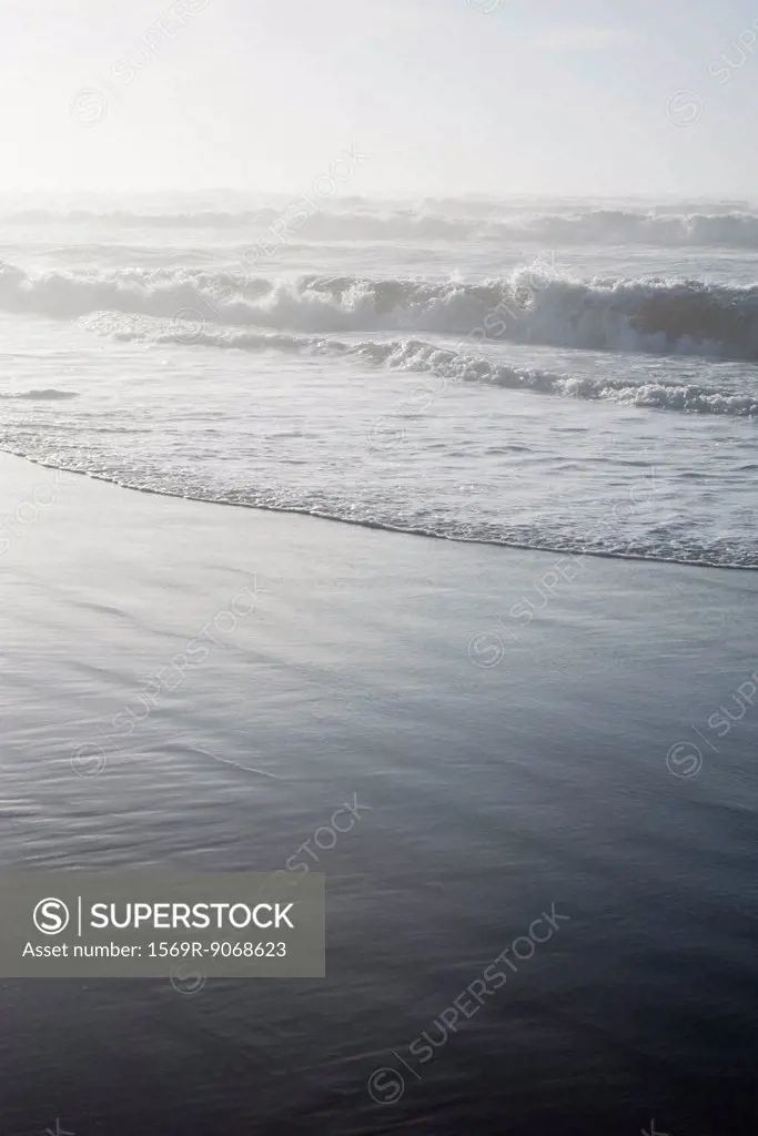 Waves washing onto shore