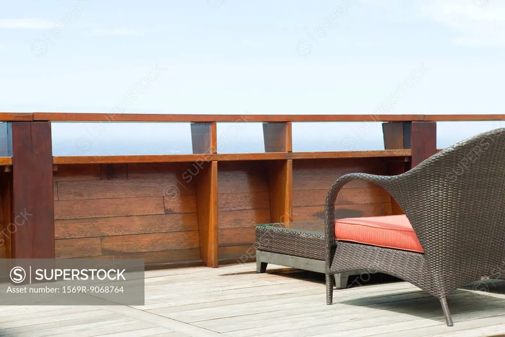 Wicker patio furniture on deck