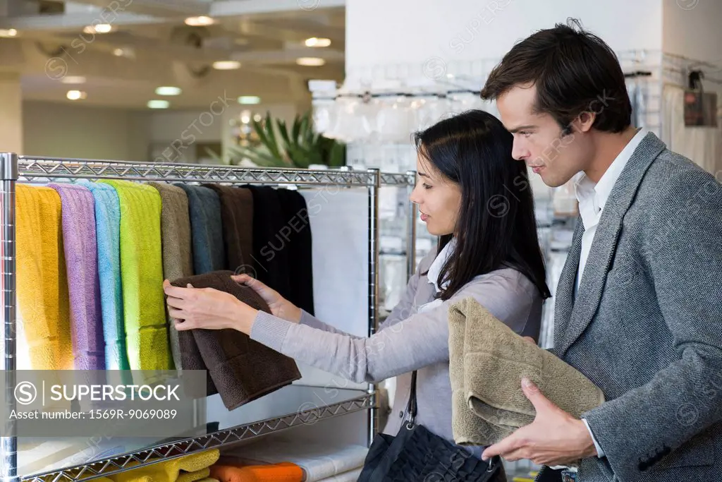 Couple shopping for bath towels