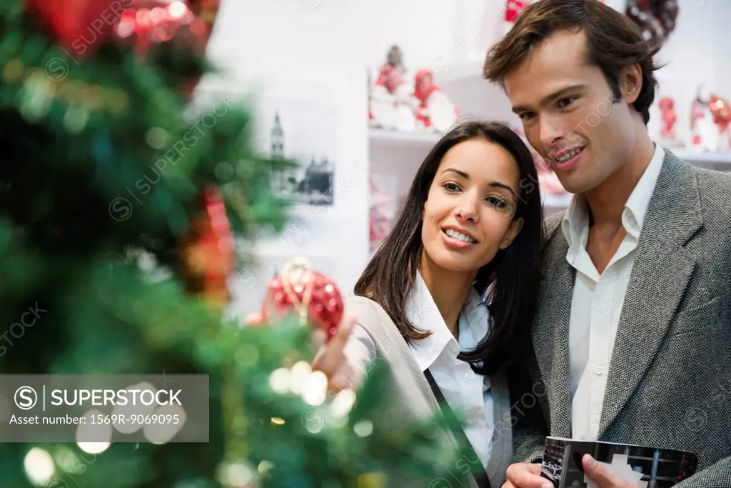 Couple shopping for Christmas decorations