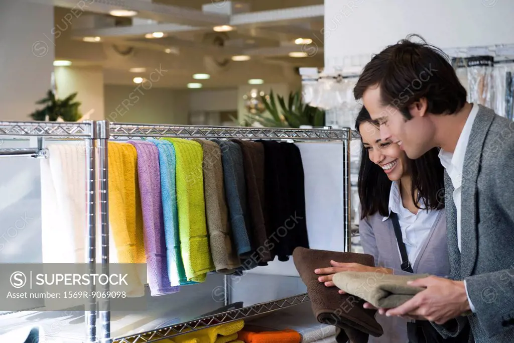 Couple shopping for bath towels
