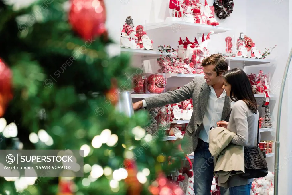 Couple shopping for Christmas decorations