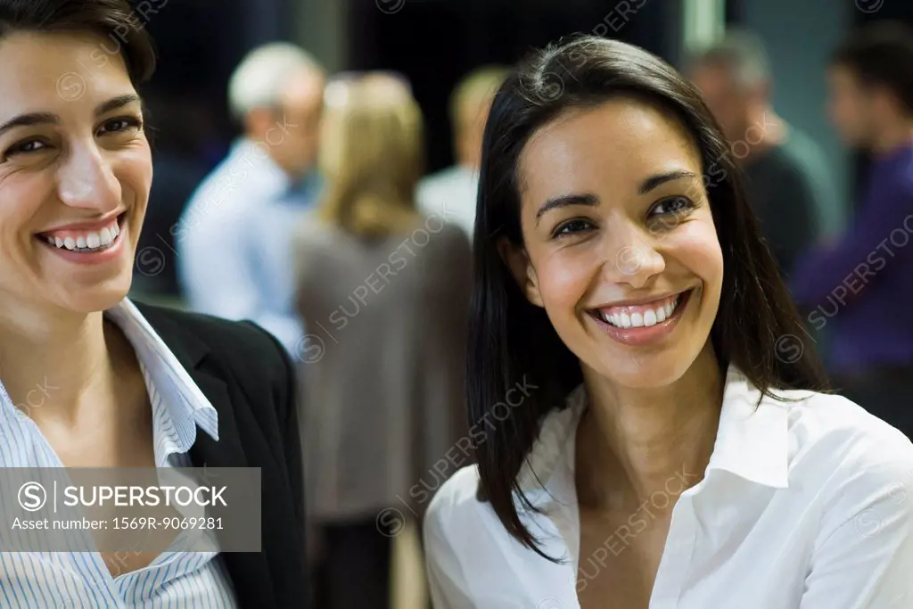 Professional women laughing, portrait