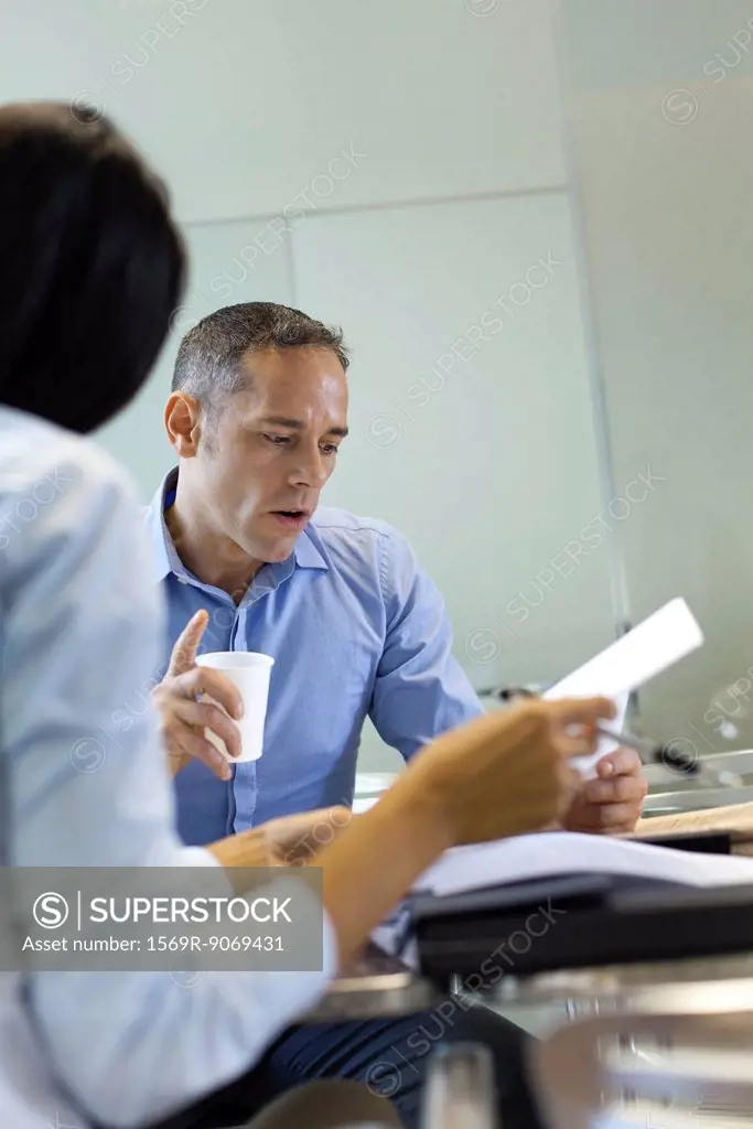 Businessman working with colleague