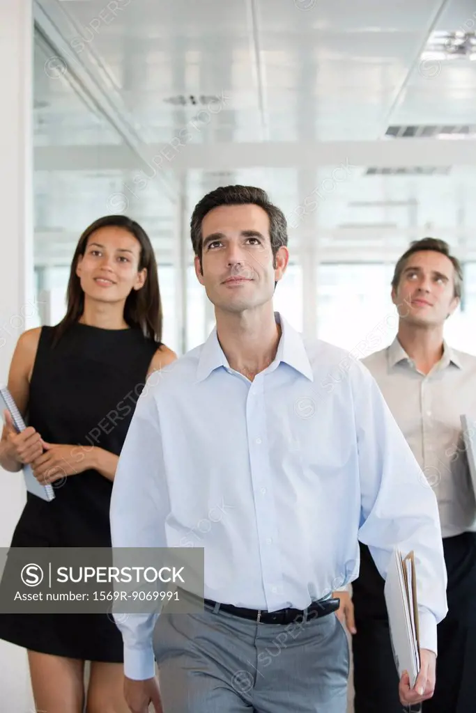 Executives walking in office