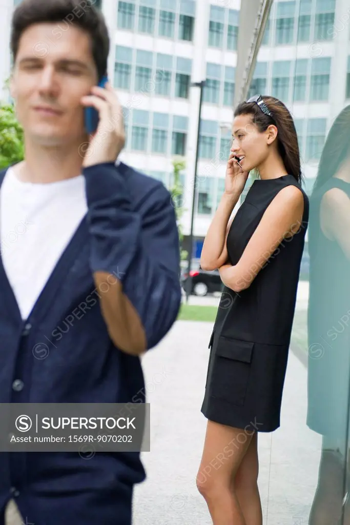 Woman talking on cell phone outdoors
