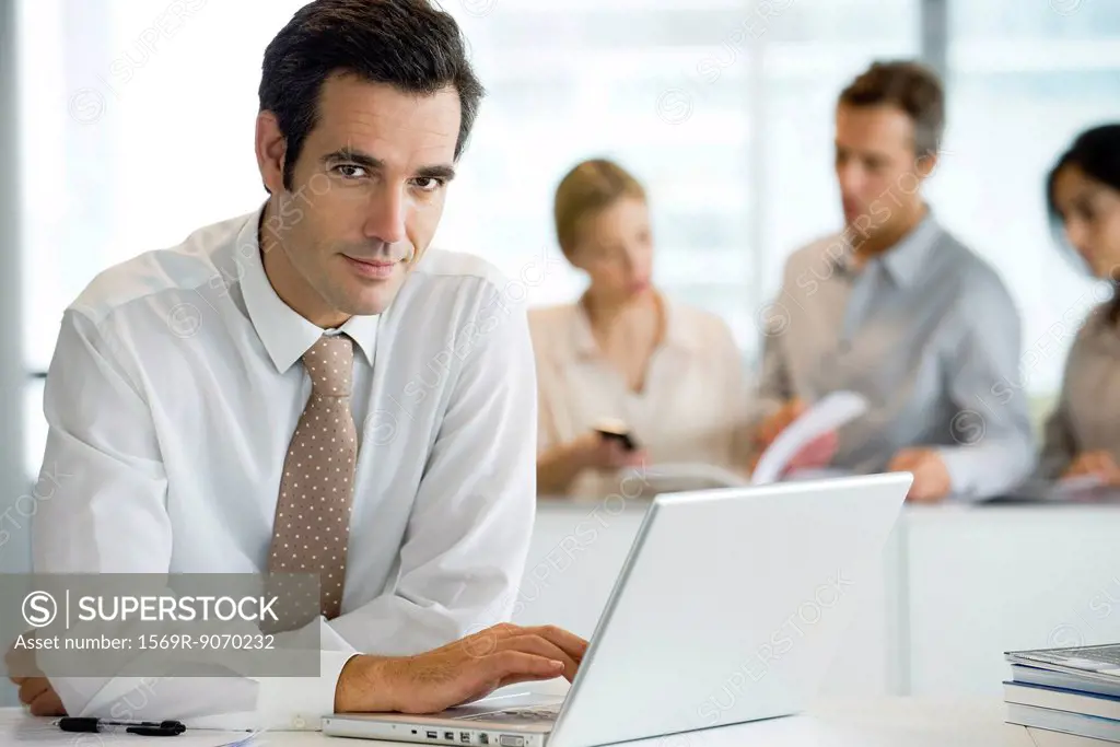 Businessman using laptop computer