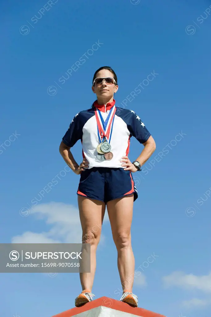 Female athlete standing on winner´s podium