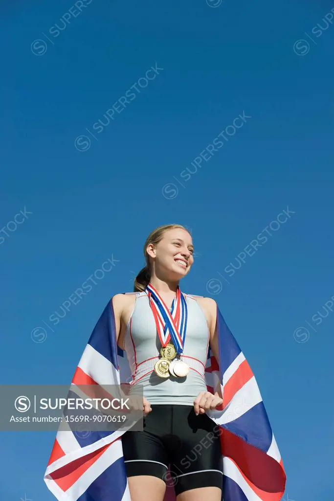 Female athlete being honored on podium