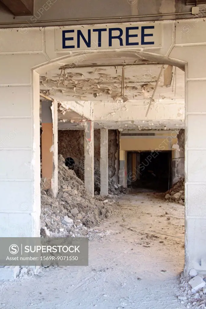 Obsolete entrance with heaps of rubble