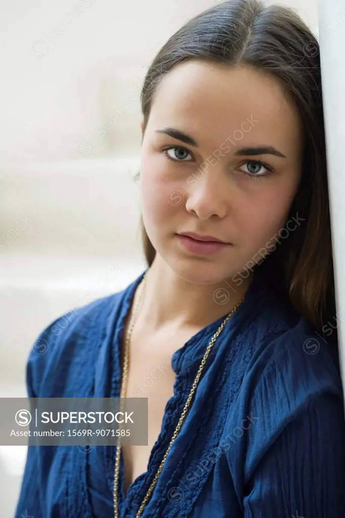 Young woman looking at camera, portrait