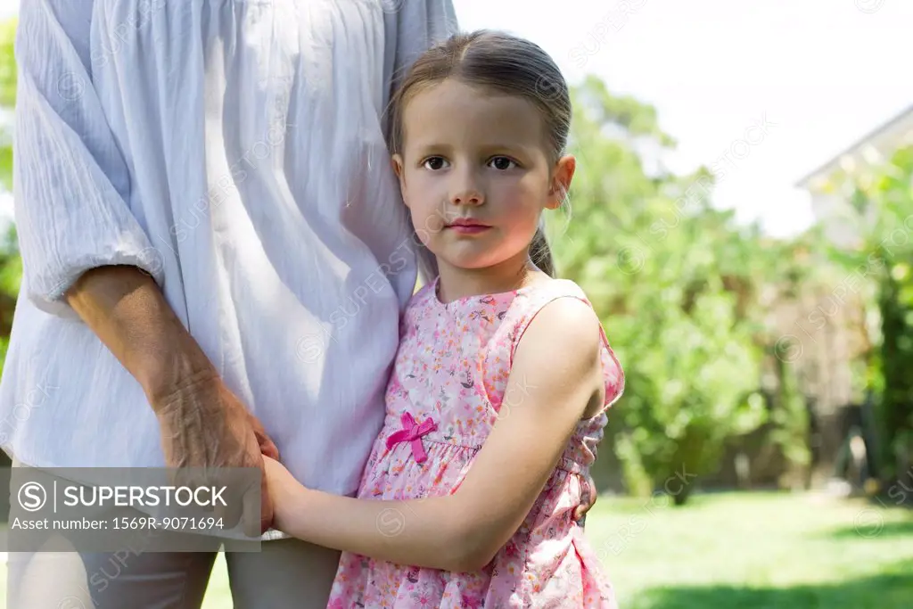 Little girl holding grandmother´s hands, cropped