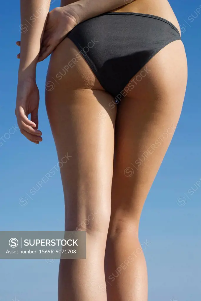 Woman wearing bikini, cropped rear view