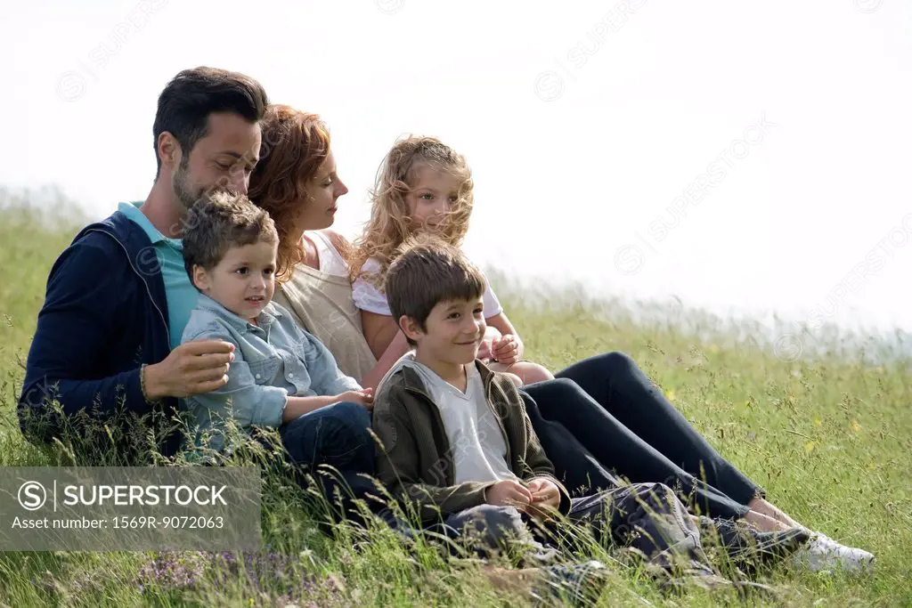 Family relaxing together outdoors