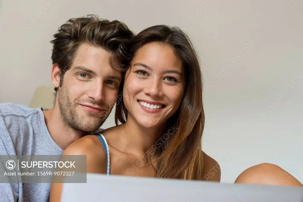 Young couple, low angle view