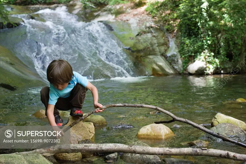 Young boy exploring nature