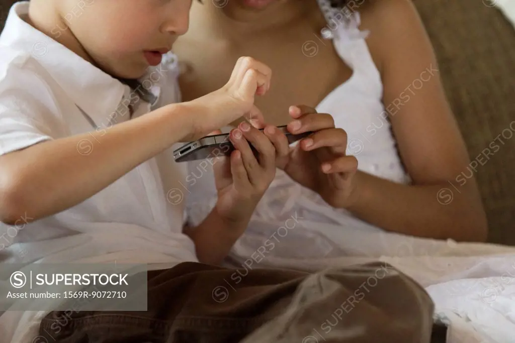 Children playing with smartphone