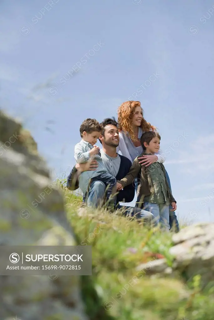 Parents and young boys in nature