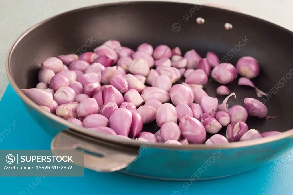 Shallots in pan