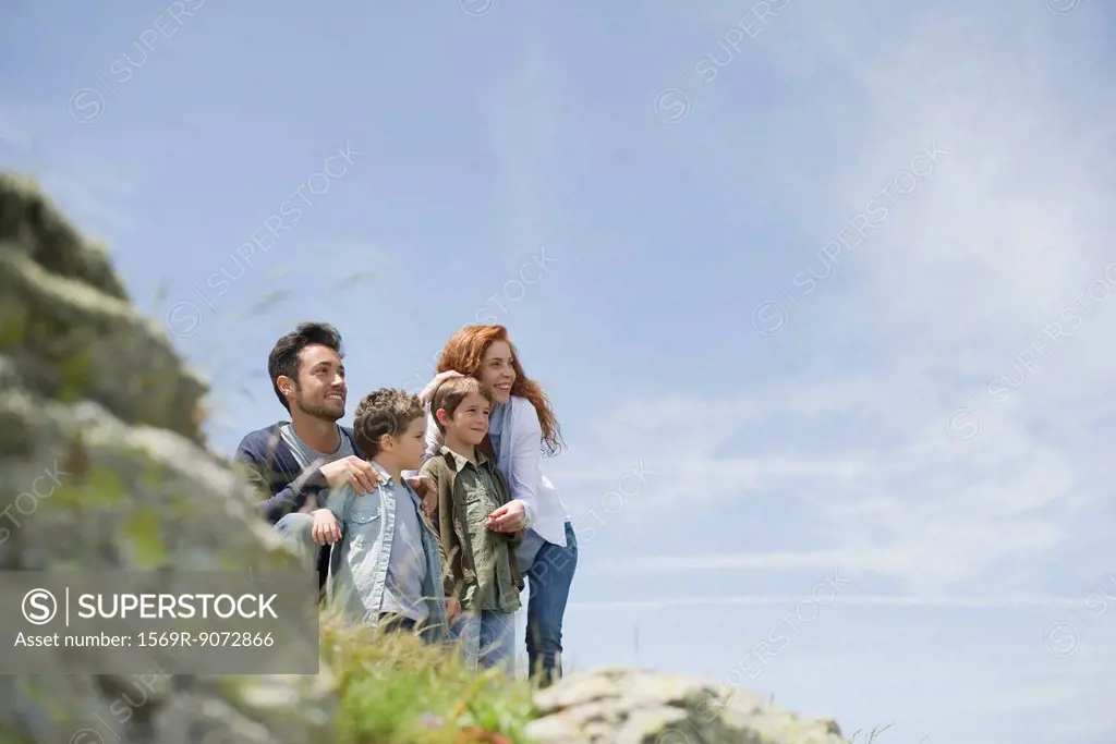 Parents and young boys in nature