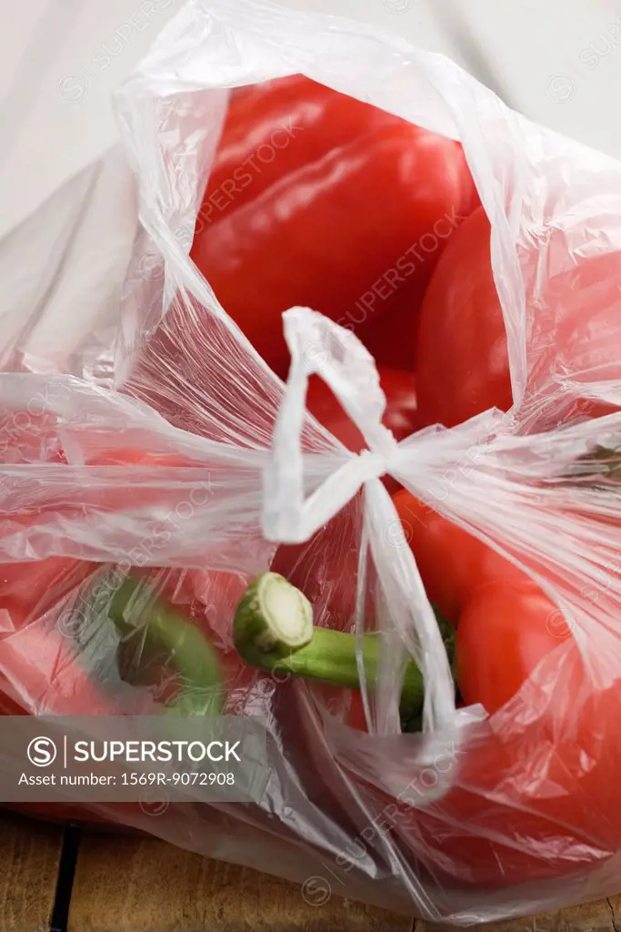 Red bell peppers in plastic bag