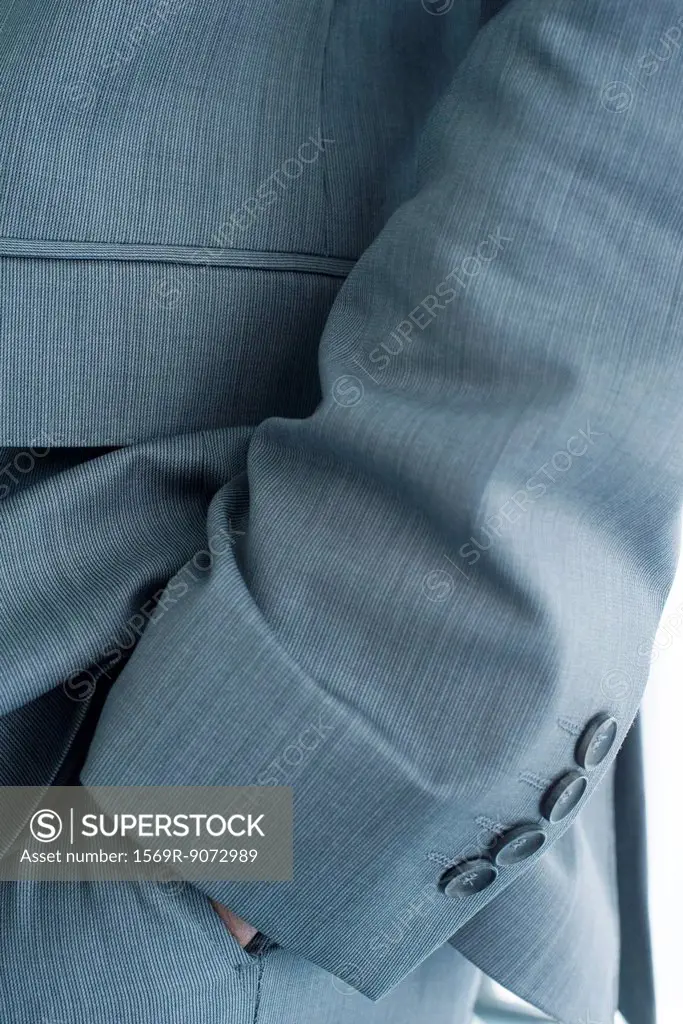 Executive with hand in pocket, cropped